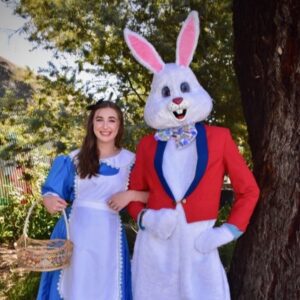 Alice in Wonderland standing with bunny character