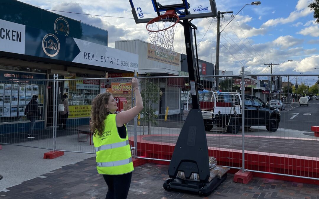 Woman shooting a basketball