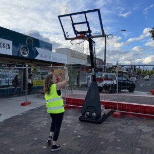 Woman shooting a basketball