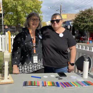 Two women standing side by side